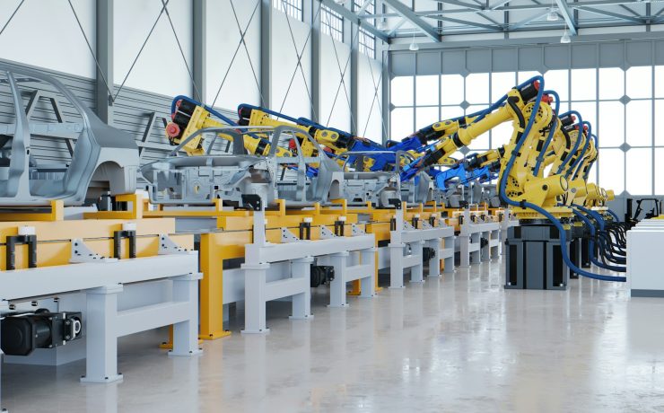 Robotic automotive assembly in factory.